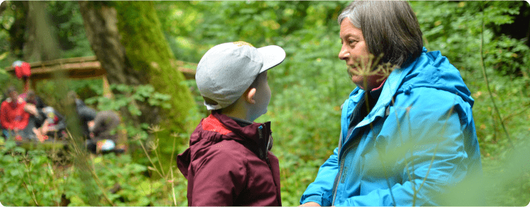 Child and adult engage in conversation - reframing disability