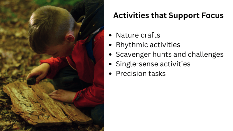 Activities that support focus - Child writing on a piece of bark with charcoal