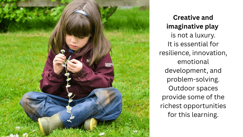 Creative and Imaginative play is not a luxury (child sitting on the grass making a daisy chain)