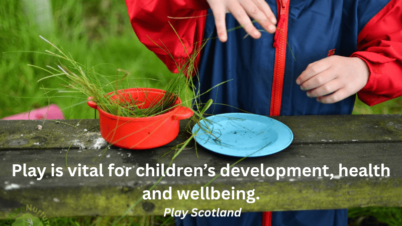child’s hands playing in the mud kitchen